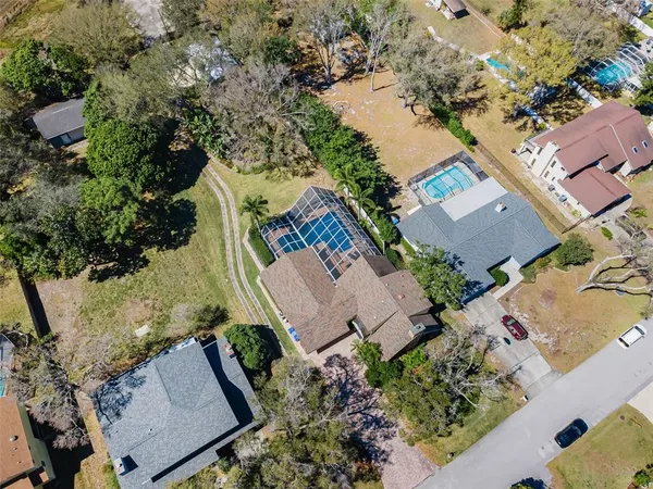 an aerial view of a house with a garden