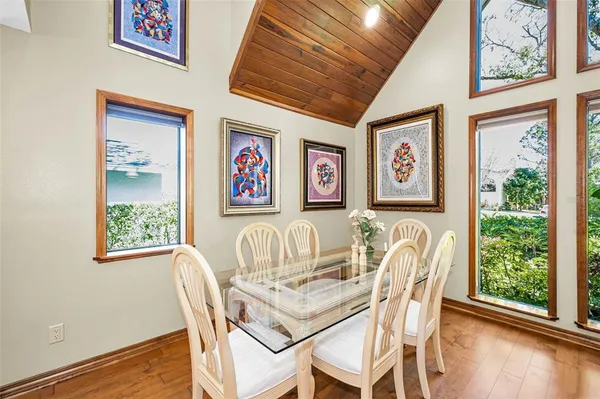 a view of room with workspace and windows