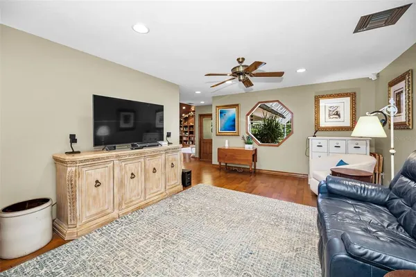 a kitchen with stainless steel appliances granite countertop a stove sink and cabinets