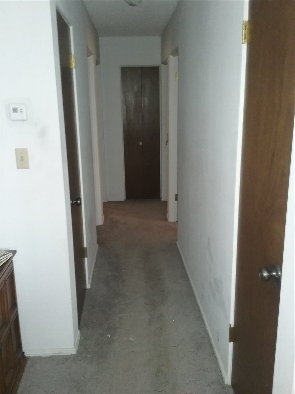 17825 Surface Creek Road Cedaredge, CO 81413 - Photo 15 of 24 a view of a hallway to rooms
