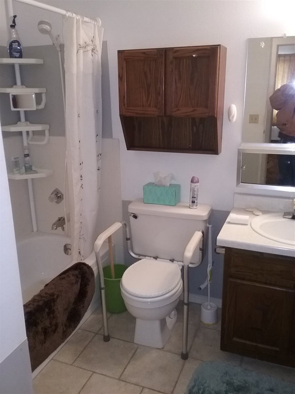 17825 Surface Creek Road Cedaredge, CO 81413 - Photo 16 of 24 a bathroom with a toilet a sink and a bathtub