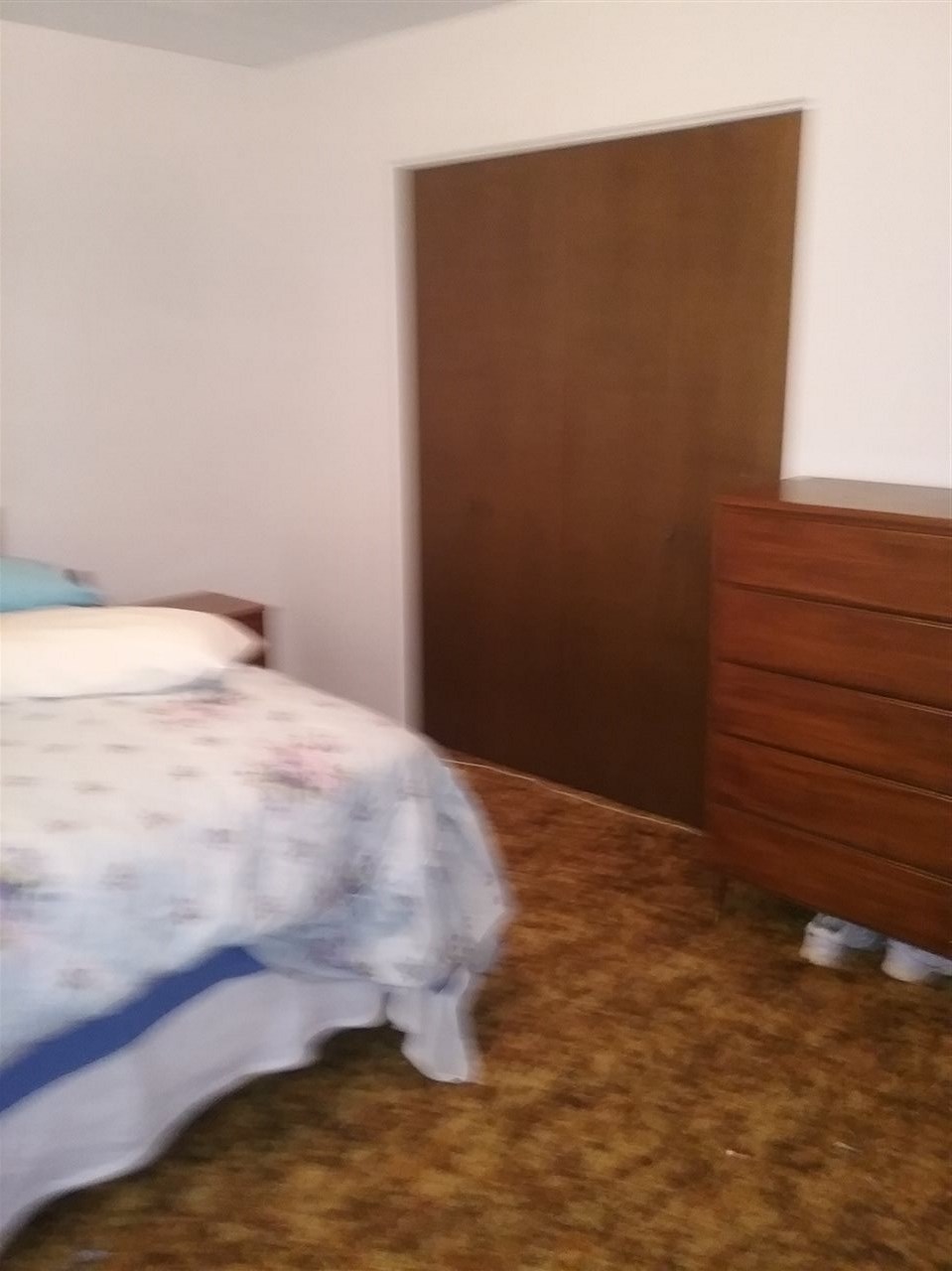 17825 Surface Creek Road Cedaredge, CO 81413 - Photo 19 of 24 a bedroom with a bed