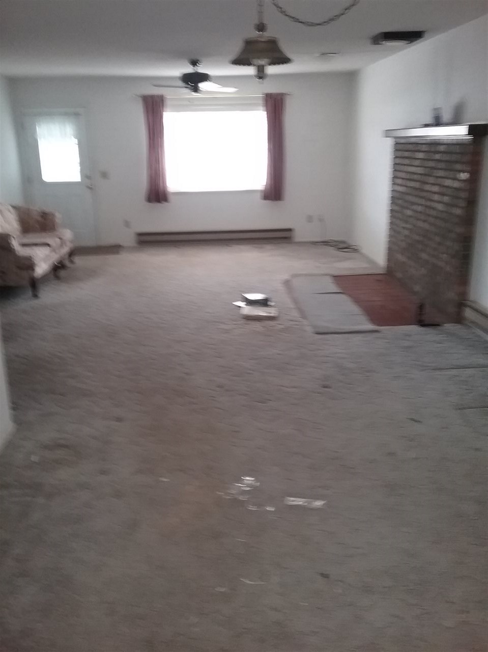 17825 Surface Creek Road Cedaredge, CO 81413 - Photo 7 of 24 a view of empty room with windows