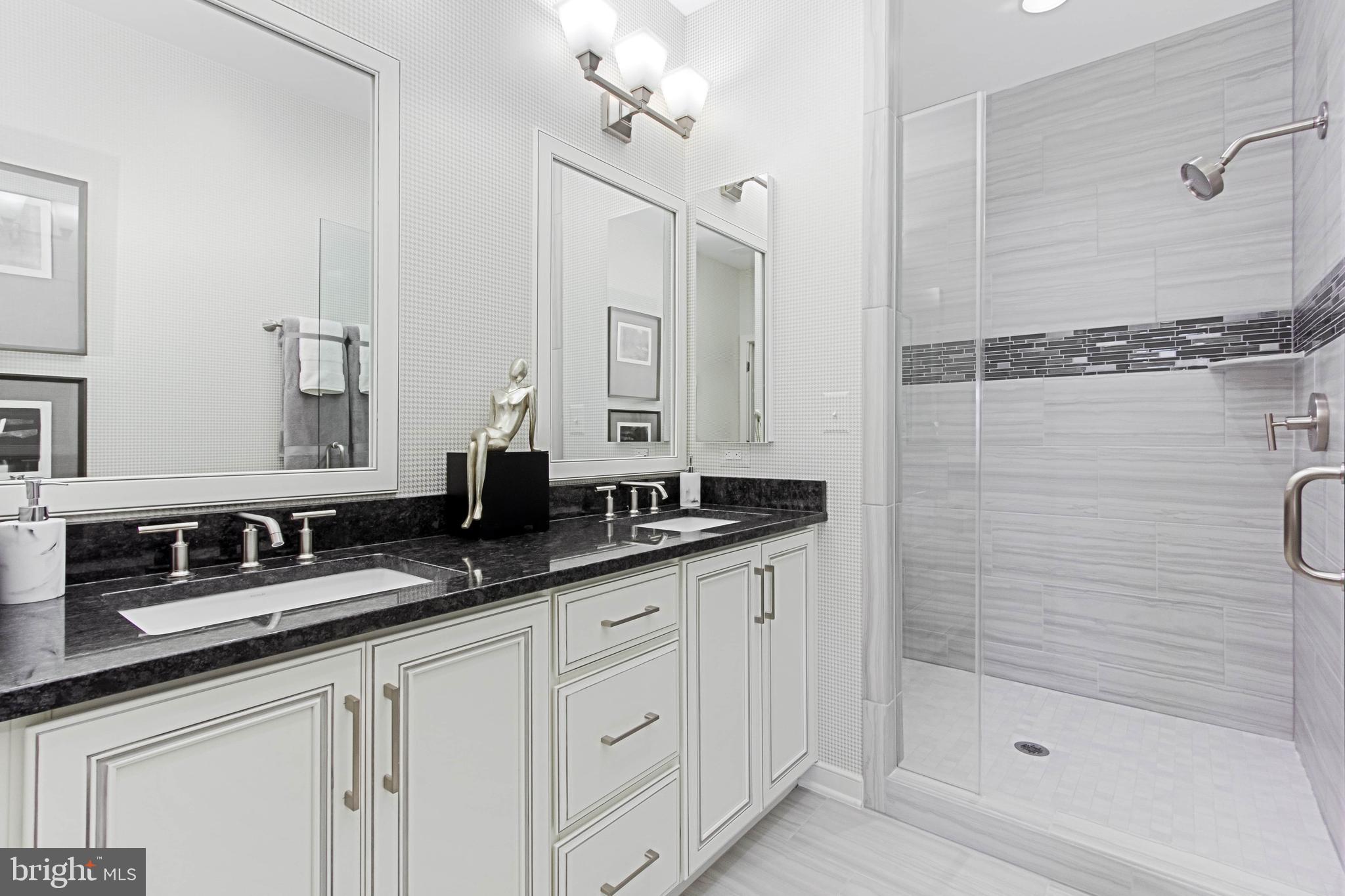 1892 Easterly Road, Unit 2014 Reston, VA 20190 - Photo 8 of 12 Walk in Primary Shower with Frameless Shower Door