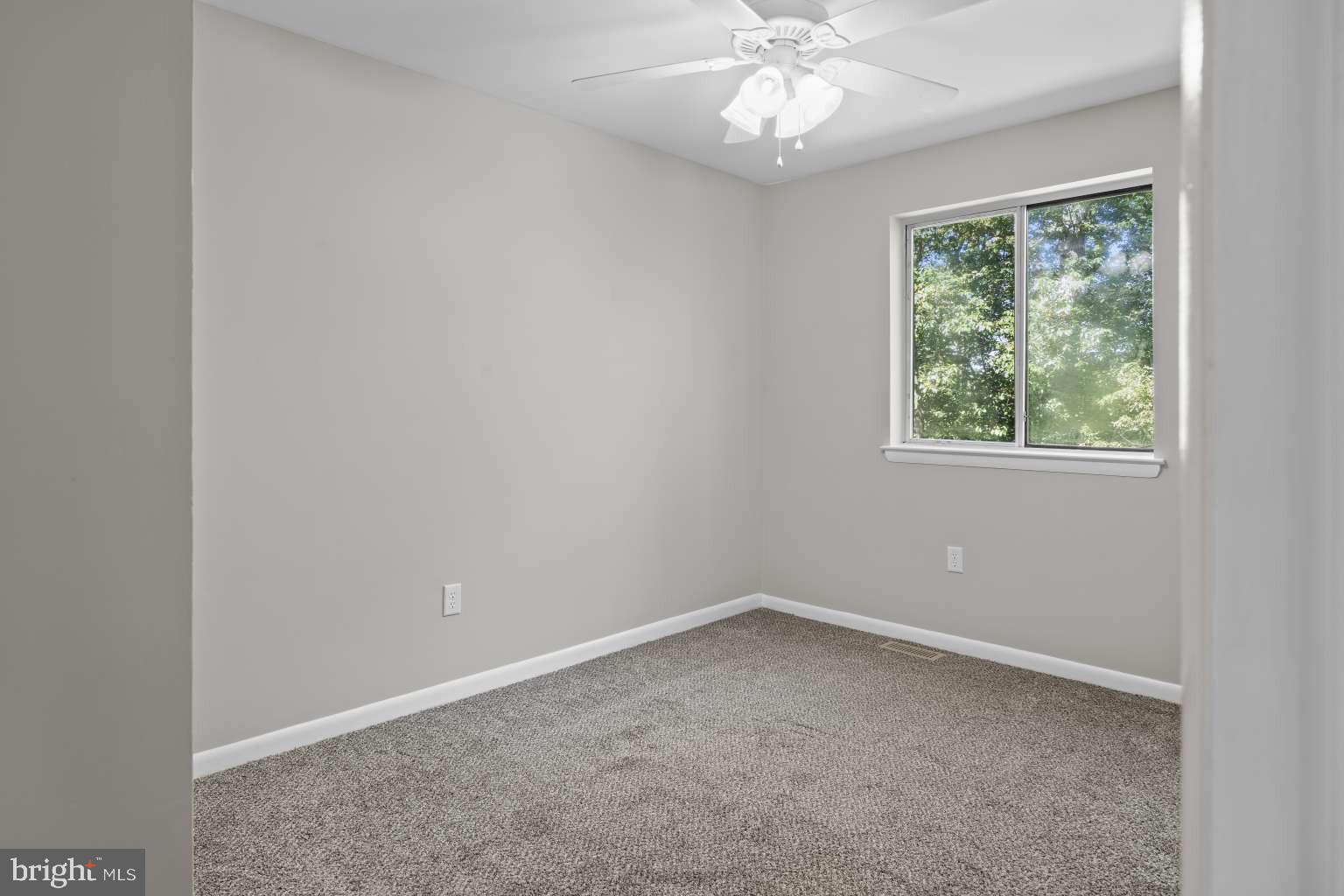 32 Millbridge Court Nottingham, MD 21236 - Photo 22 of 39 an empty room with a window