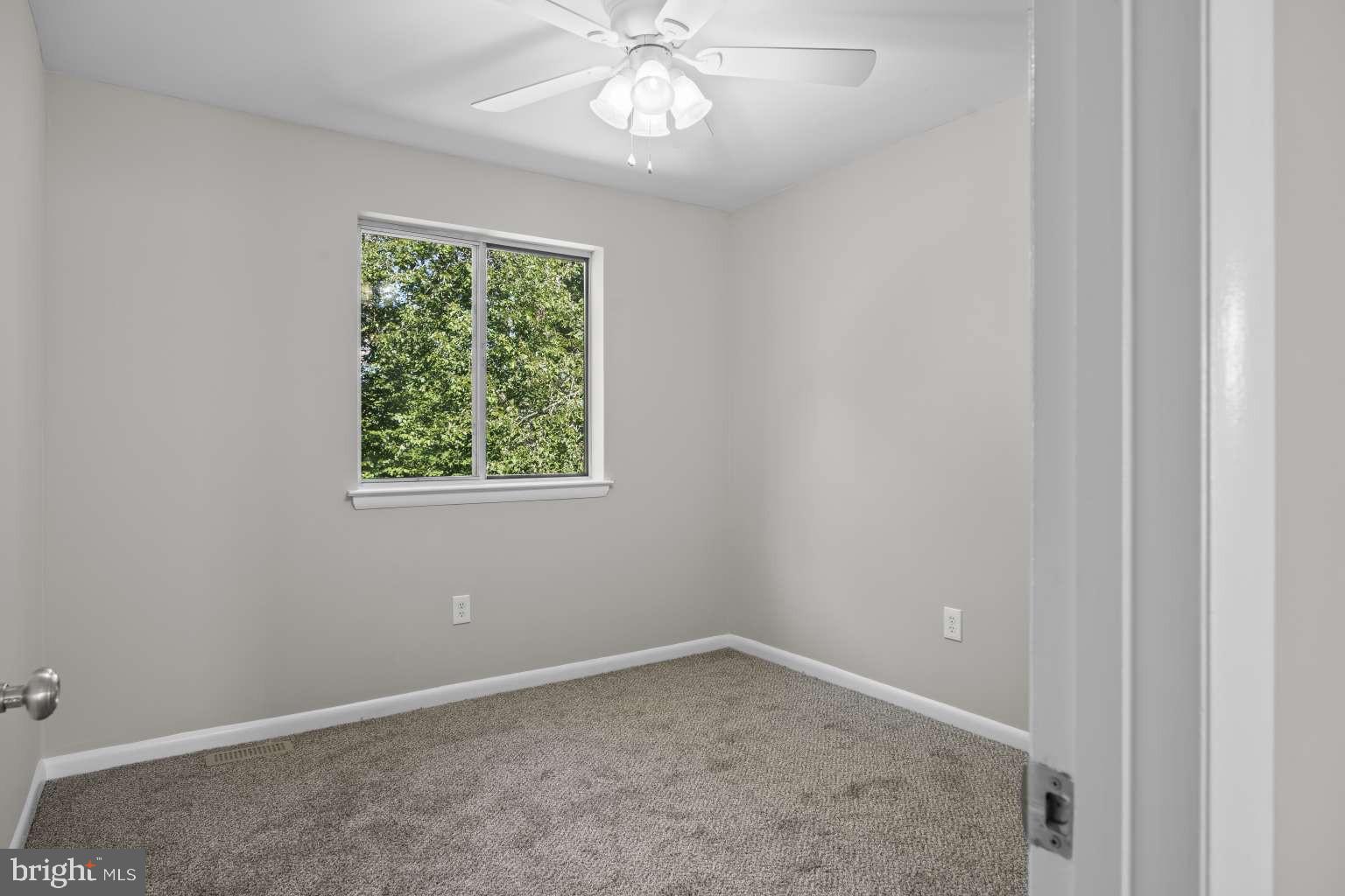 32 Millbridge Court Nottingham, MD 21236 - Photo 24 of 39 an empty room with a window