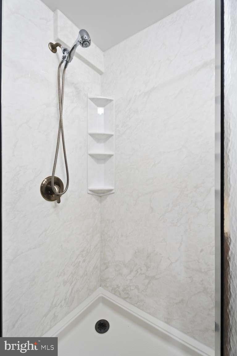 32 Millbridge Court Nottingham, MD 21236 - Photo 29 of 39 a bathroom with a shower
