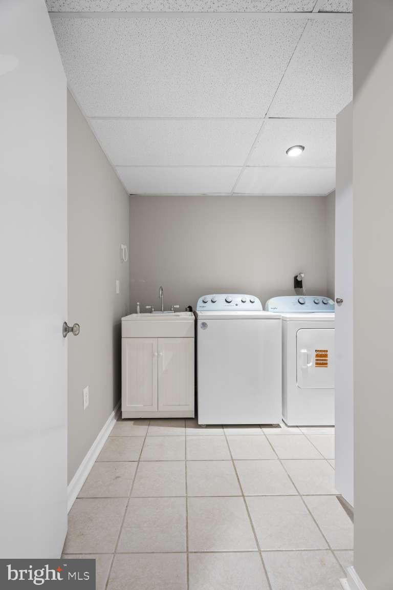 32 Millbridge Court Nottingham, MD 21236 - Photo 30 of 39 a utility room with dryer and washer
