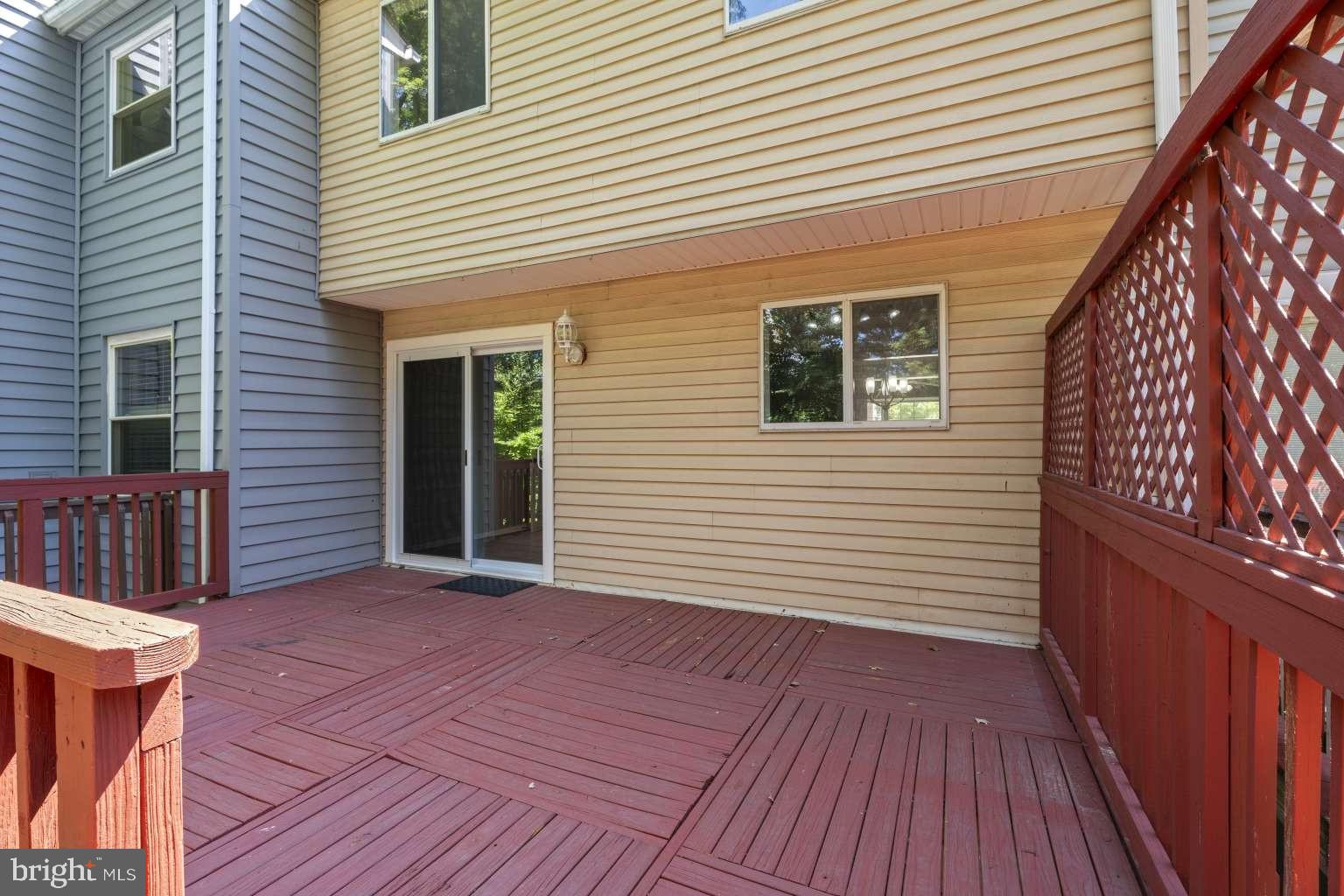 32 Millbridge Court Nottingham, MD 21236 - Photo 34 of 39 a view of a deck with wooden floor and fence