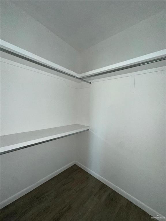 1002 North Glasscock Road, Unit 6 Mission, TX 78572 - Photo 10 of 13 a view of an empty walk in closet