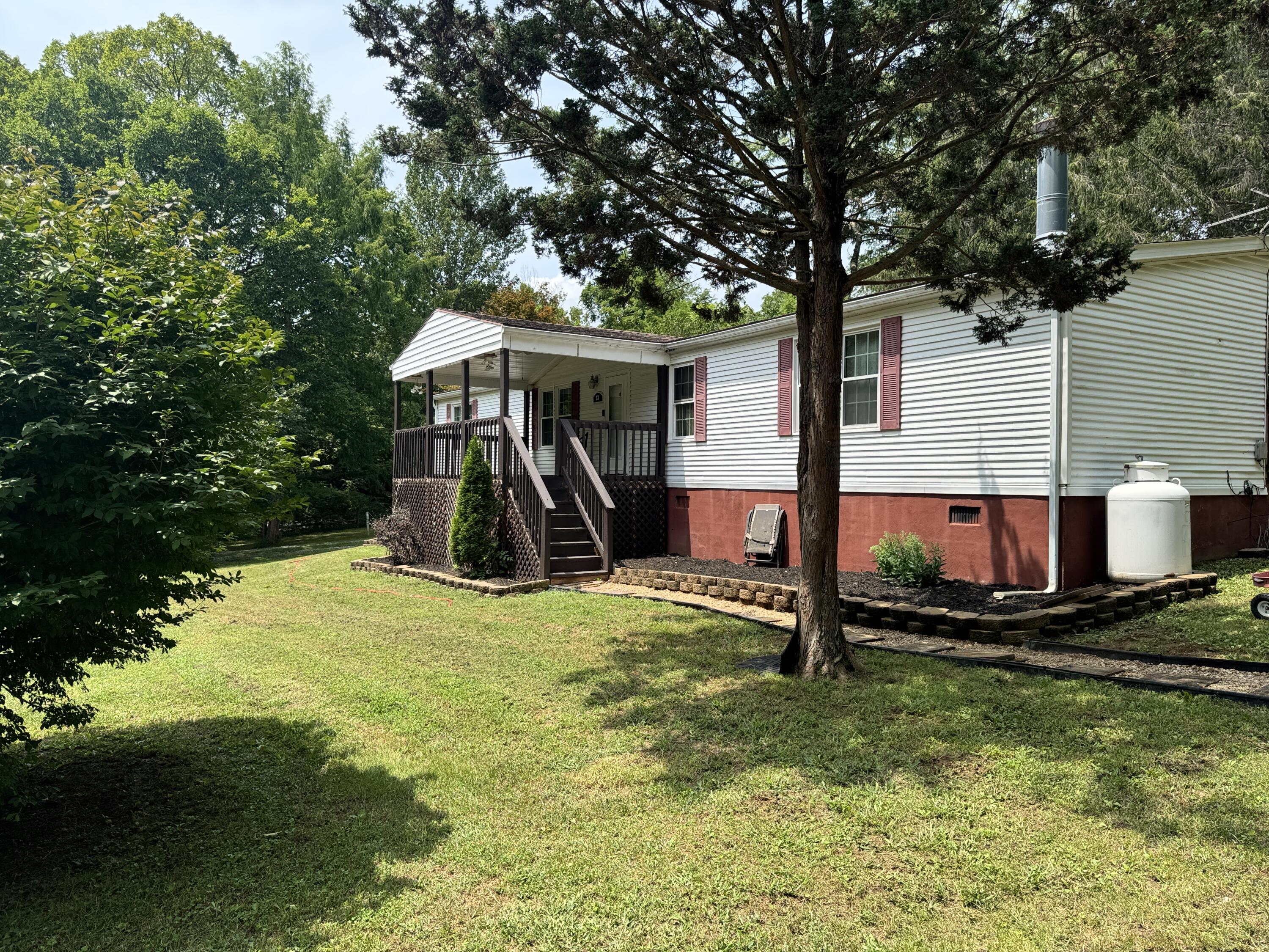 23 Meryls Road Buchanan, VA 24066 - Photo 2 of 26 side view porch
