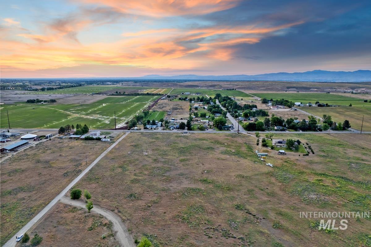 9743 West Kuna Road Kuna, ID 83634 - Photo 3 of 5 Aerial view at dusk of a view of countryside and a mountain view