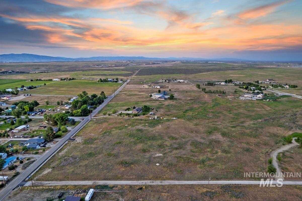 9743 West Kuna Road Kuna, ID 83634 - Photo 5 of 5 Overview of rural landscape featuring a mountainous background