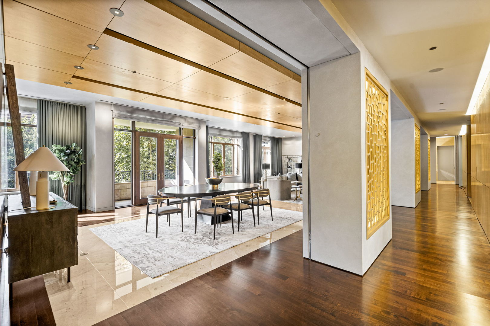 65 East Goethe Street, Unit 3W Chicago, IL 60610 - Photo 16 of 43 a dining room with wooden floor and large window