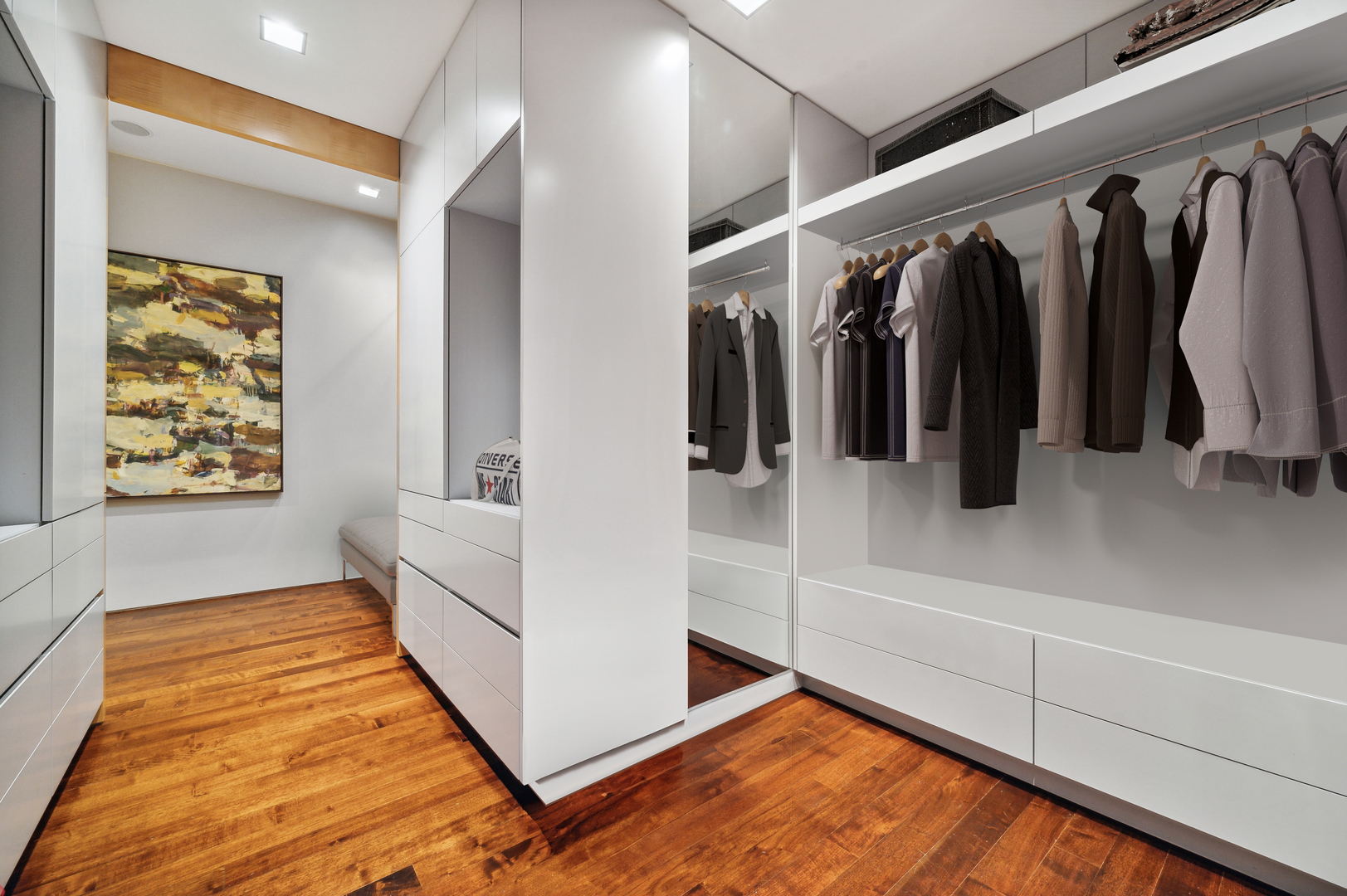 65 East Goethe Street, Unit 3W Chicago, IL 60610 - Photo 30 of 43 a view of walk in closet with clothes and shoes