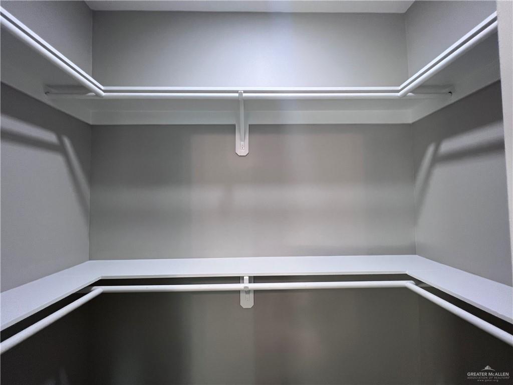 1812 Red Bud Drive, Unit 1 Weslaco, TX 78596 - Photo 18 of 25 a close up view of racks on the wall