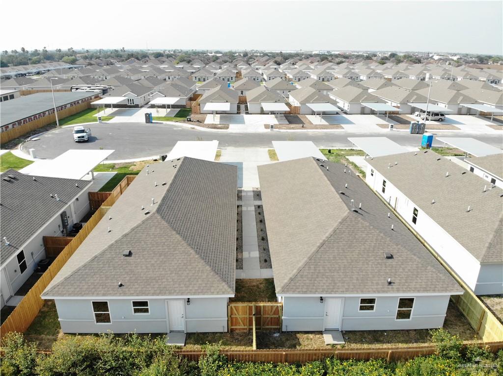 1812 Red Bud Drive, Unit 1 Weslaco, TX 78596 - Photo 25 of 25 an aerial view of residential houses with outdoor space