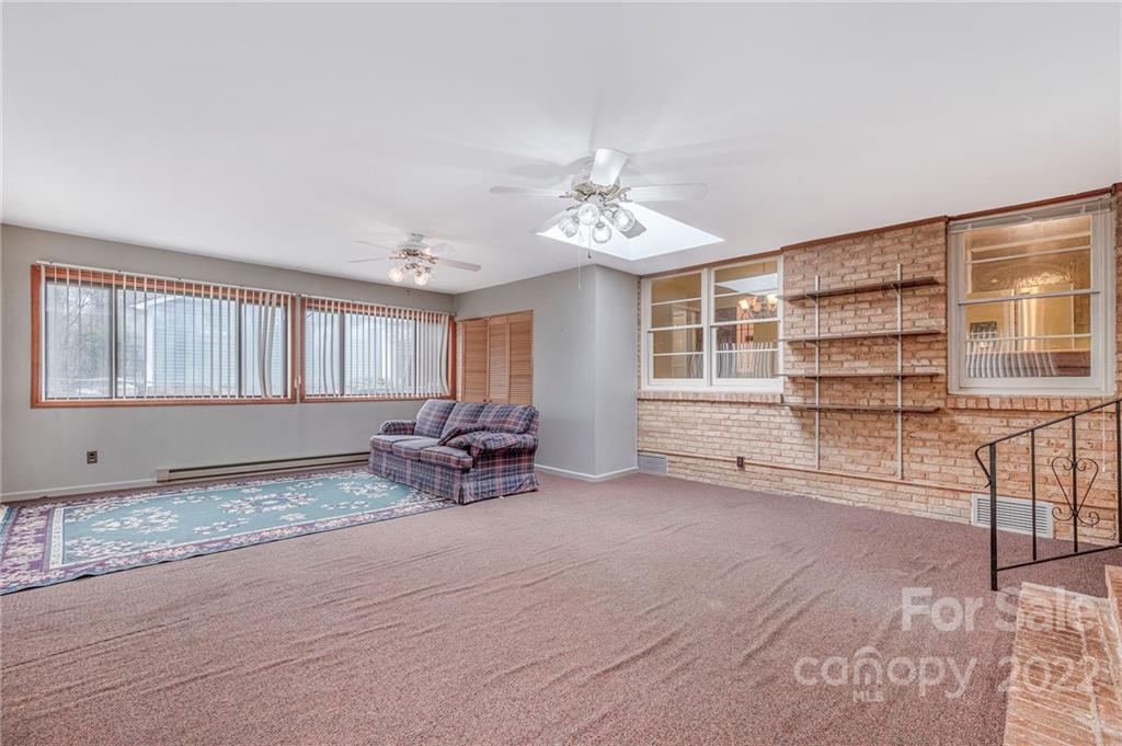 1446 McIlroy Road, Unit 8 Charlotte, NC 28212 - Photo 19 of 30 a view of a livingroom with furniture and a window