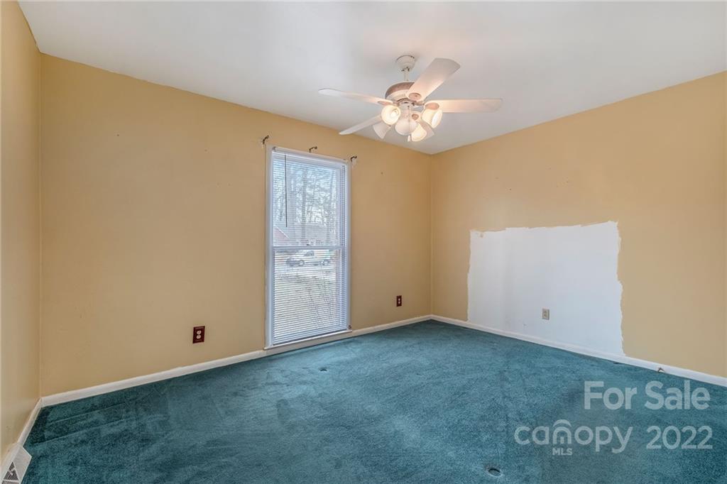 1446 McIlroy Road, Unit 8 Charlotte, NC 28212 - Photo 22 of 30 an empty room with a window