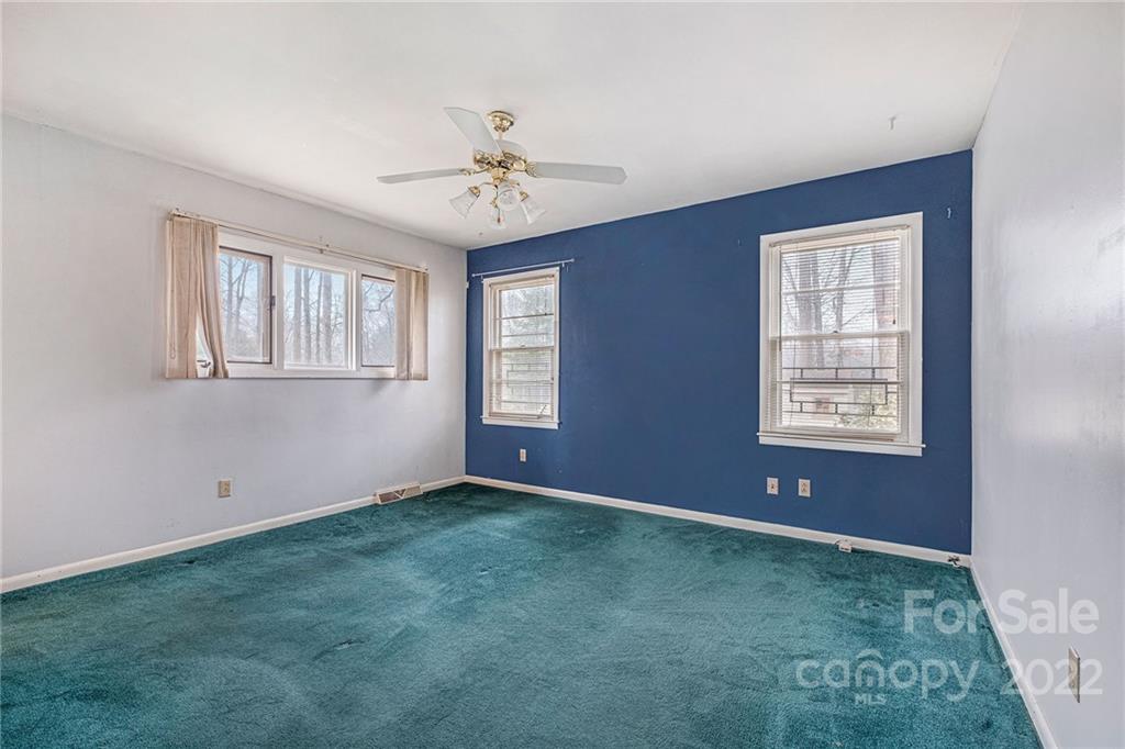 1446 McIlroy Road, Unit 8 Charlotte, NC 28212 - Photo 24 of 30 a view of an empty room with window