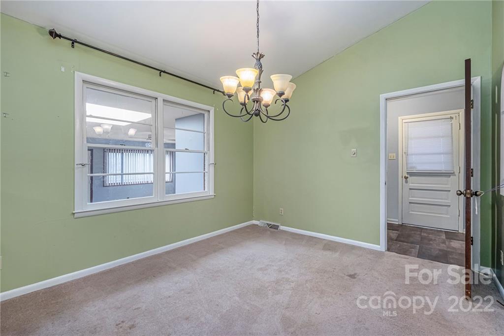 1446 McIlroy Road, Unit 8 Charlotte, NC 28212 - Photo 8 of 30 a view of livingroom with window