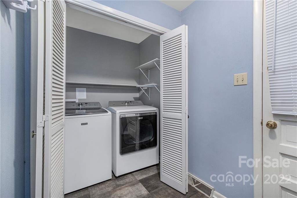 1446 McIlroy Road, Unit 8 Charlotte, NC 28212 - Photo 9 of 30 a utility room with dryer and washer
