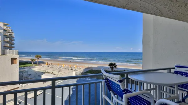 a view of a balcony with an outdoor space