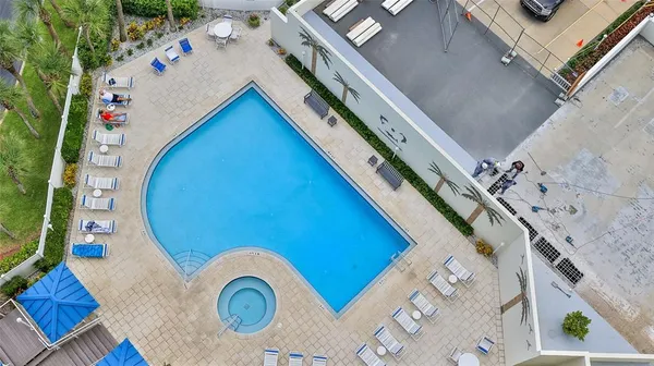 with a vase of flowers sitting on a table