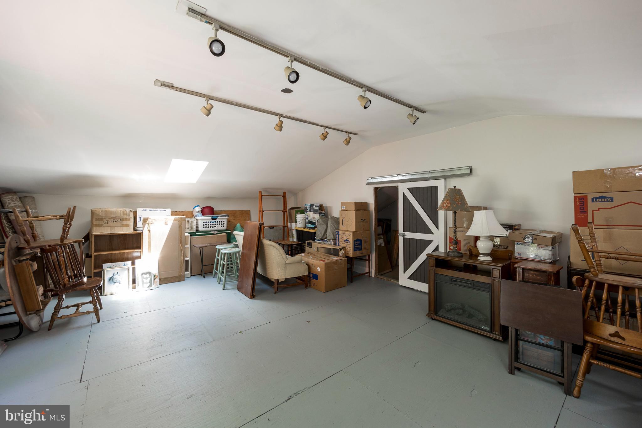 116 Ridgewood Circle Downingtown, PA 19335 - Photo 32 of 38 loft above garage interior view