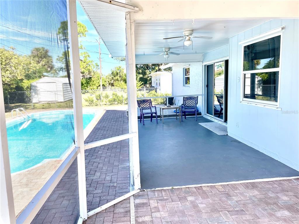 234 Shadow Street Northwest Port Charlotte, FL 33952 - Photo 26 of 48 a view of an outdoor space with seating area