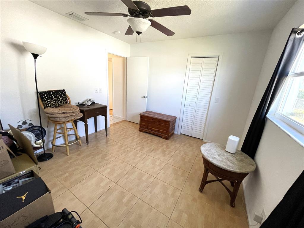 234 Shadow Street Northwest Port Charlotte, FL 33952 - Photo 35 of 48 a living room with furniture