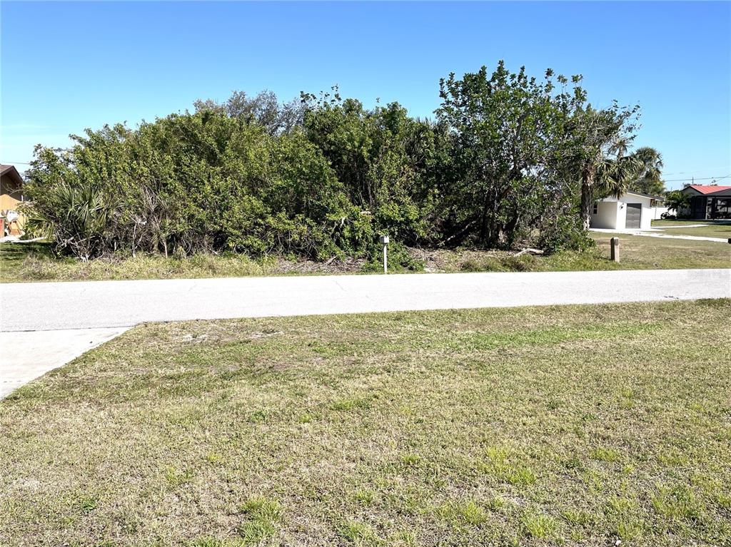 234 Shadow Street Northwest Port Charlotte, FL 33952 - Photo 44 of 48 a view of an outdoor space and a yard