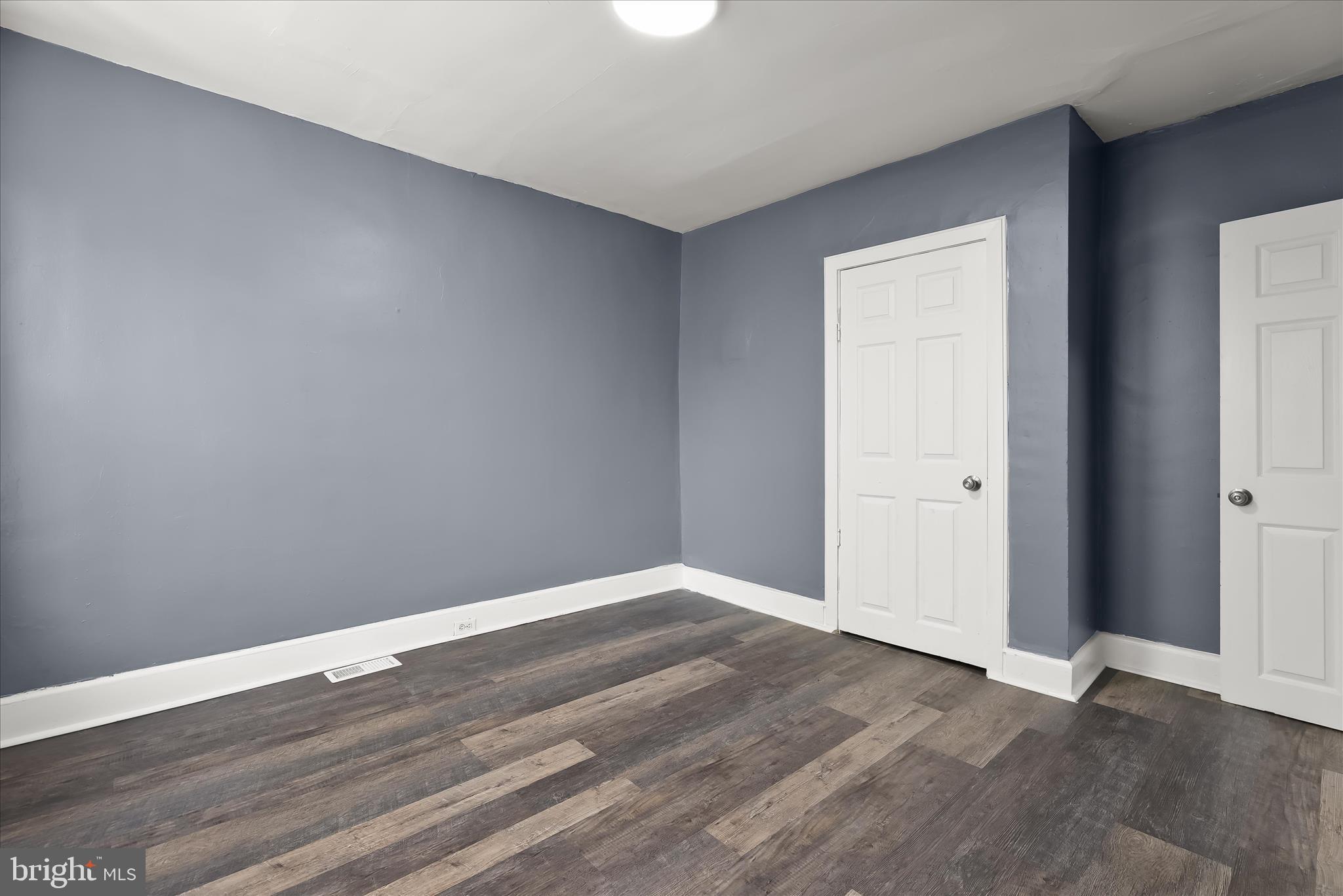 3534 Overview Road Baltimore, MD 21215 - Photo 17 of 28 a view of an empty room with wooden floor