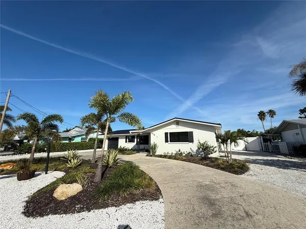 a house view with a outdoor space