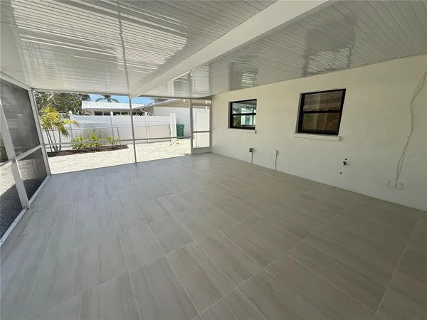 a view of a livingroom with wooden floor
