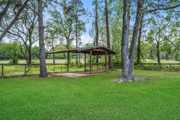 $425,000 | 7457 County Line Road, Willis, TX 77378