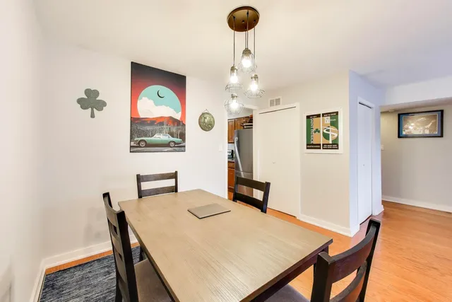 a view of a dining room with furniture