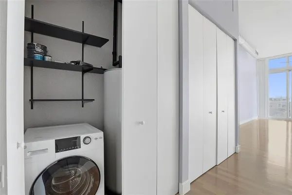 a utility room with dryer and washer