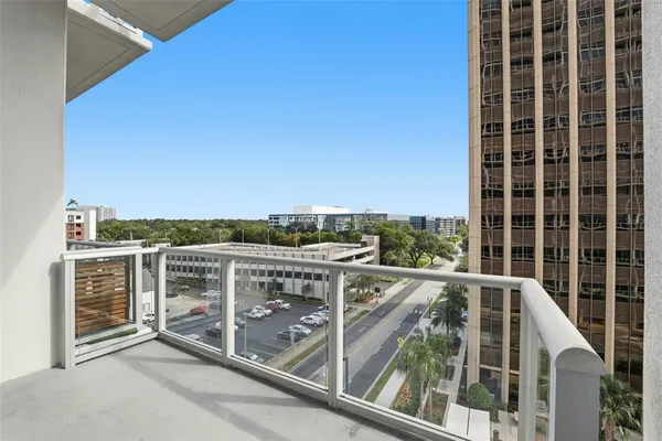 a view of balcony with furniture