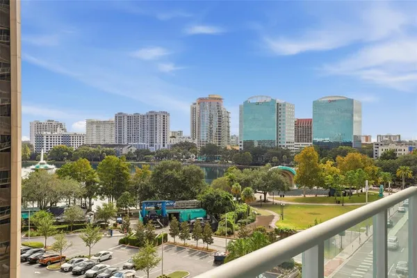 a view of a city skyline from a balcony