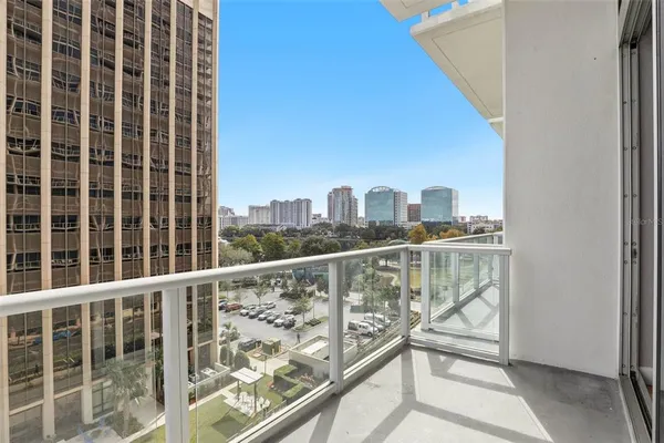 a view of a city skyline from a balcony