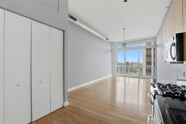a view of a livingroom with wooden floor