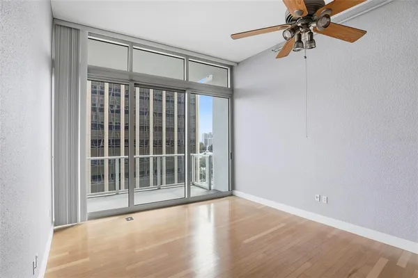a view of an empty room with a window