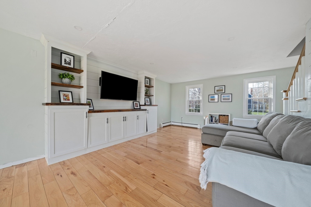 44 Jayna Way Marshfield, MA 02050 - Photo 9 of 27 a living room with furniture and a flat screen tv