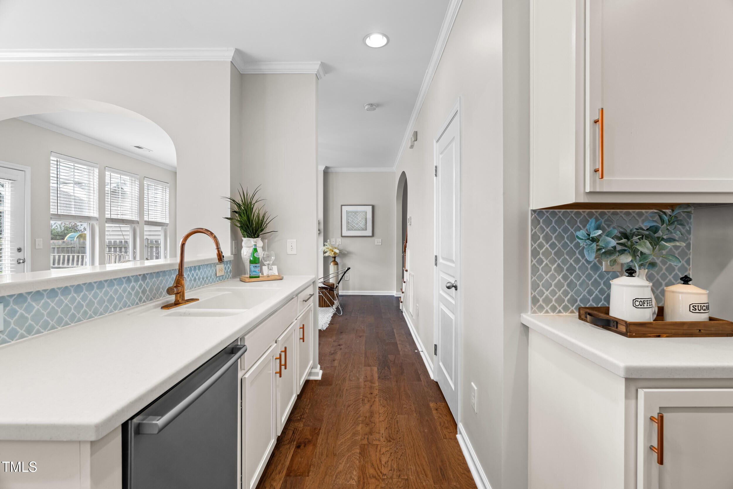2816 Prospect Parkway Durham, NC 27703 - Photo 11 of 38 a view of a kitchen with a sink and dishwasher