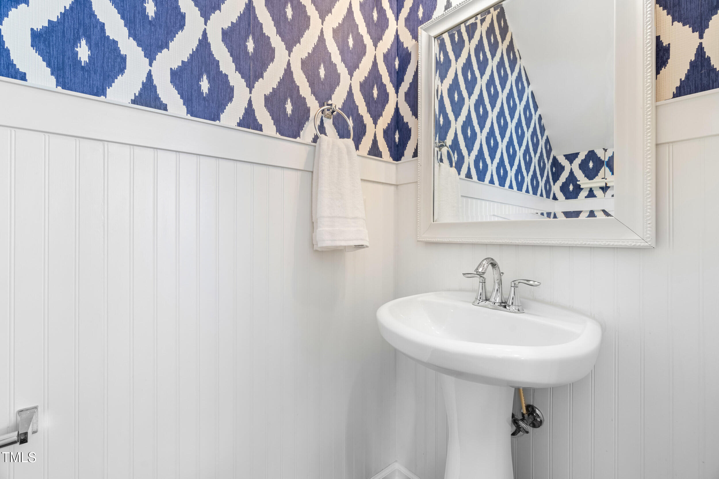 2816 Prospect Parkway Durham, NC 27703 - Photo 19 of 38 a bathroom with a sink and a mirror