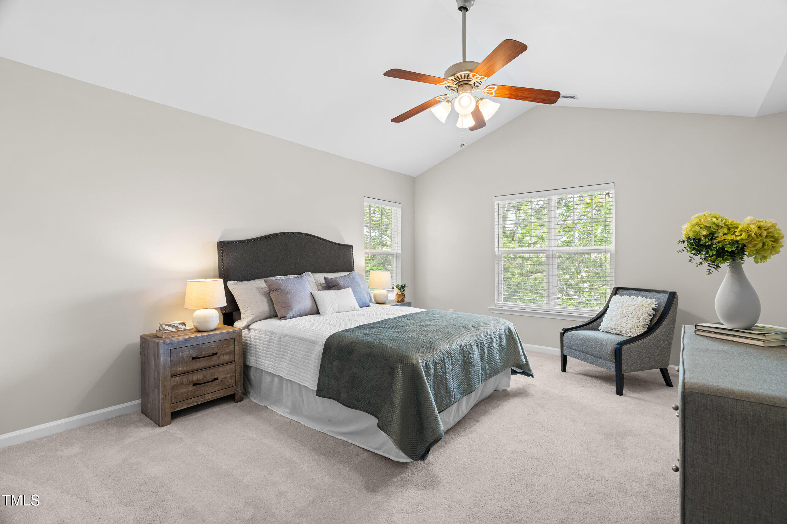 2816 Prospect Parkway Durham, NC 27703 - Photo 20 of 38 a bedroom with a bed and a chair