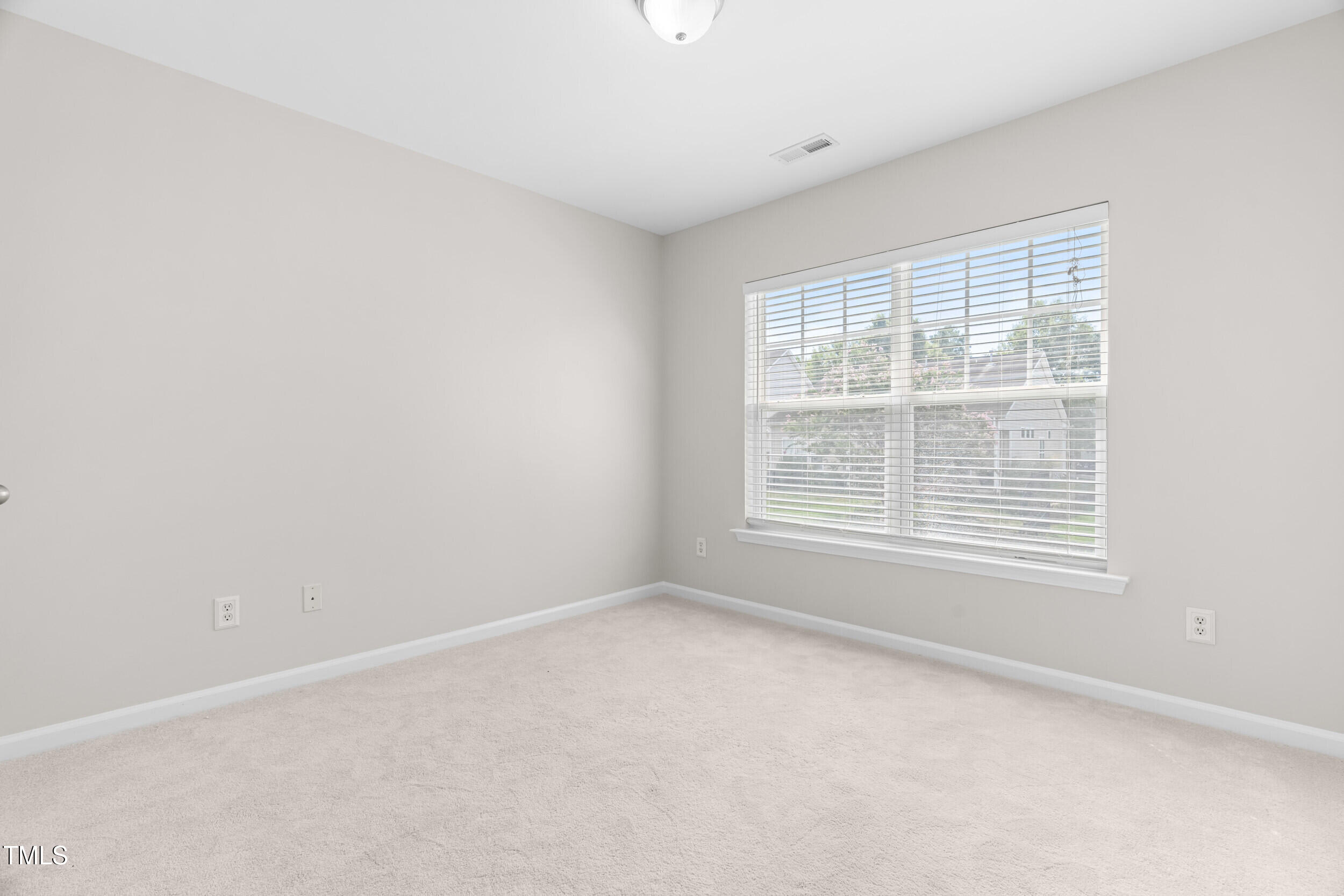 2816 Prospect Parkway Durham, NC 27703 - Photo 28 of 38 an empty room with a window