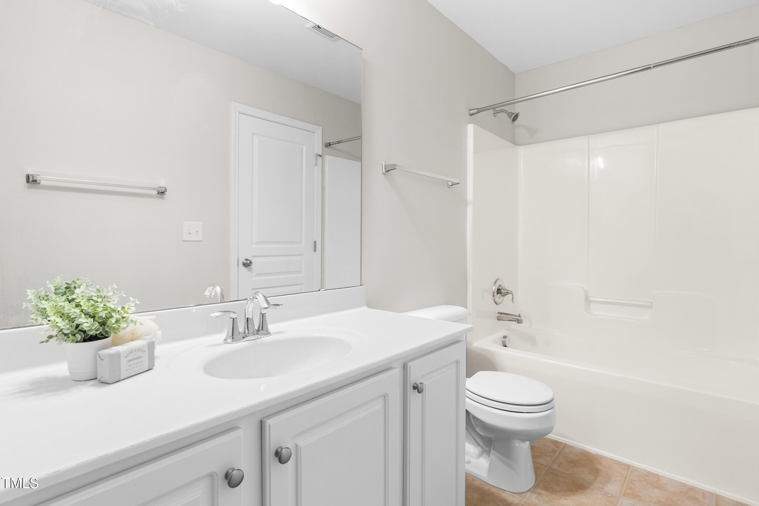 2816 Prospect Parkway Durham, NC 27703 - Photo 30 of 38 a bathroom with a sink a toilet and shower