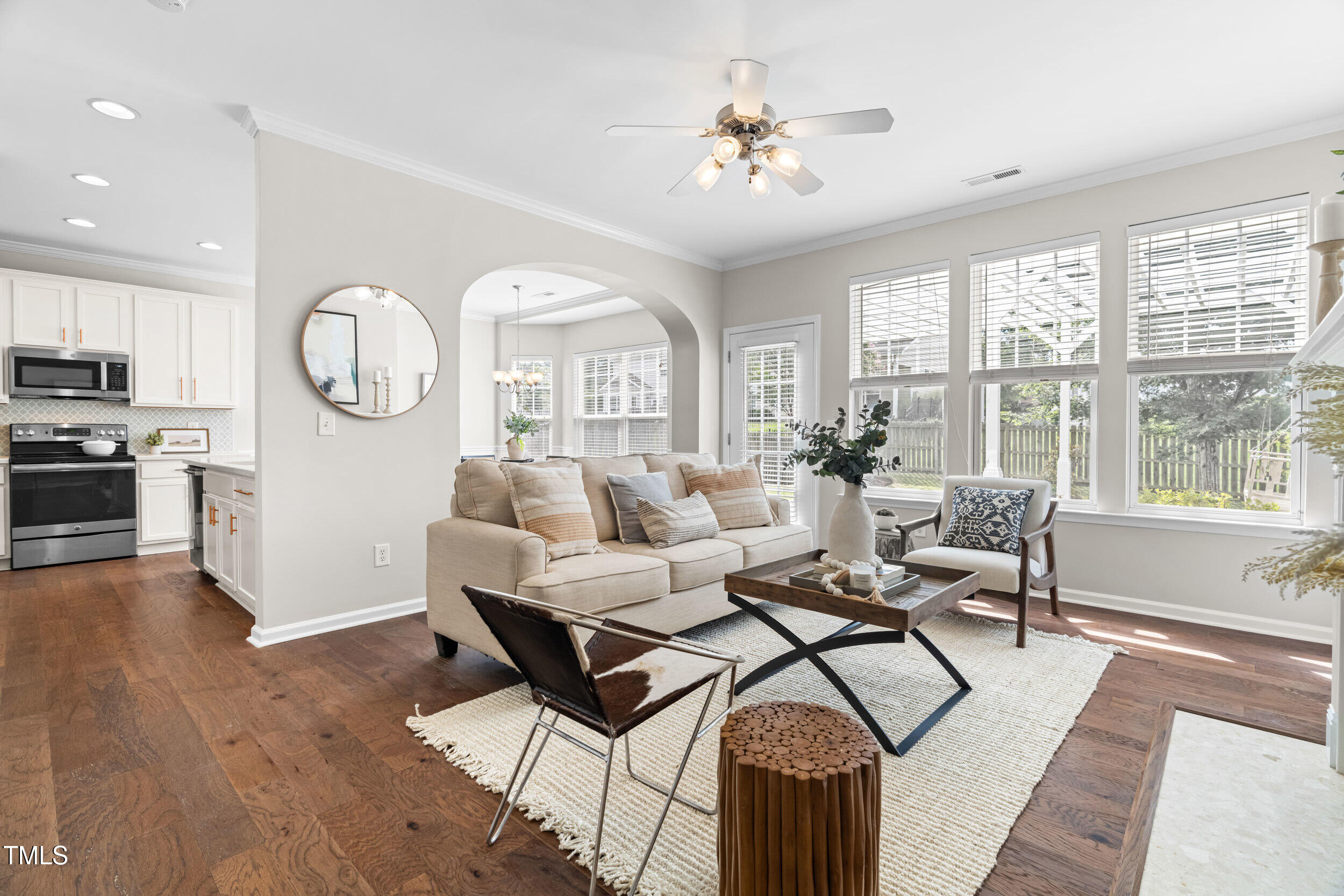 2816 Prospect Parkway Durham, NC 27703 - Photo 4 of 38 a living room with fireplace furniture and a large window